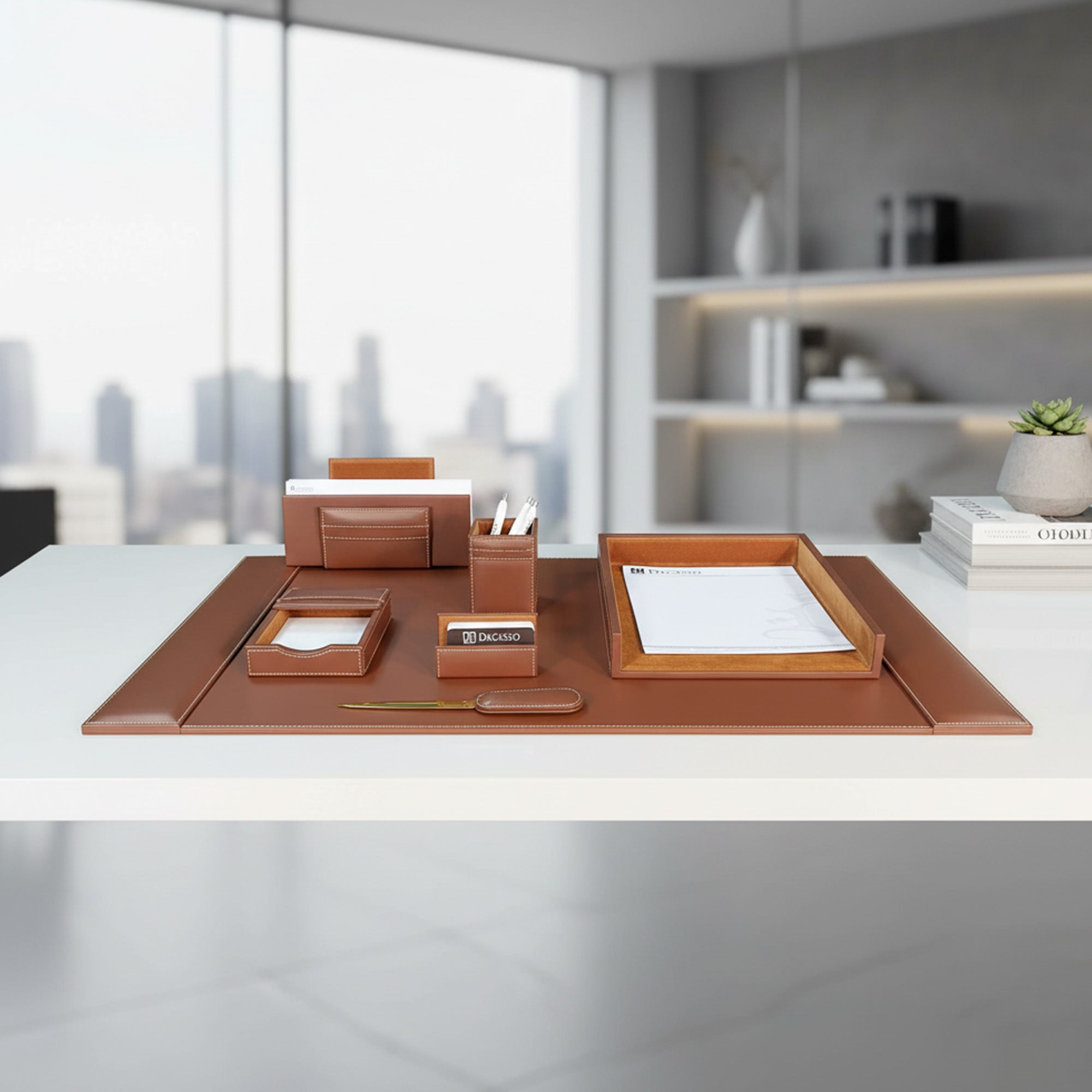 Brown leather desk set on a white desk