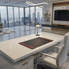 Modern office space with a large desk, chair, and cityscape view.